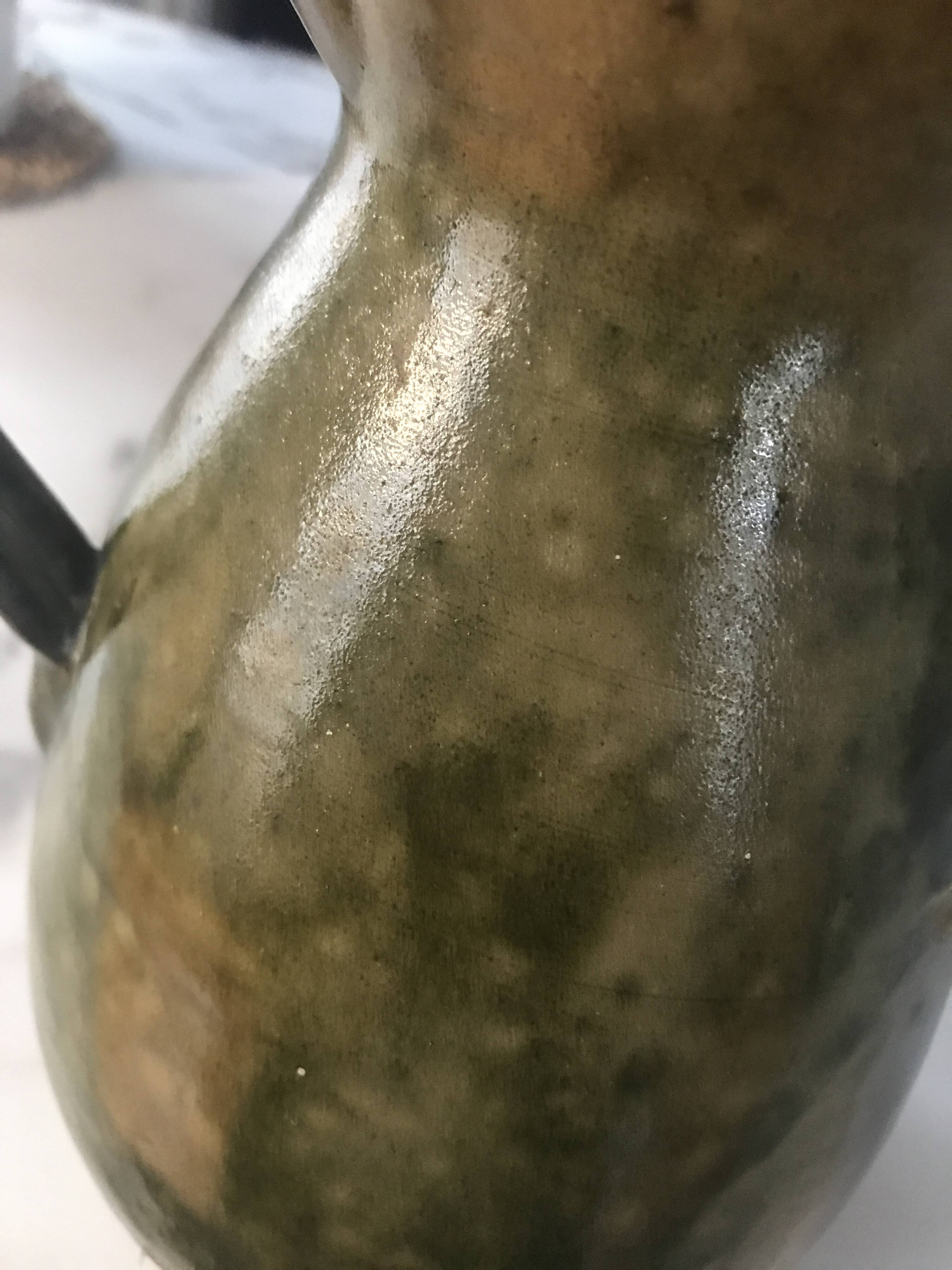 Spotted enamel jug