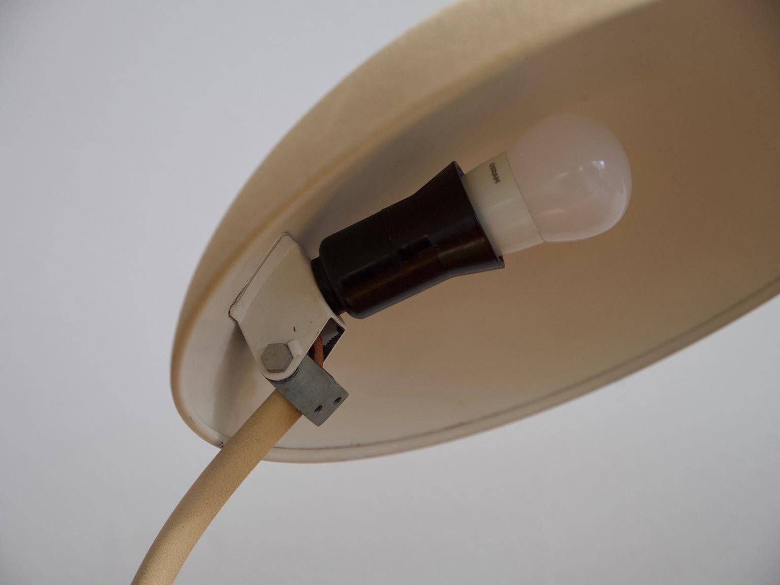 Pair of painted beige metal table lamps, 1930s
