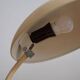 Pair of painted beige metal table lamps, 1930s