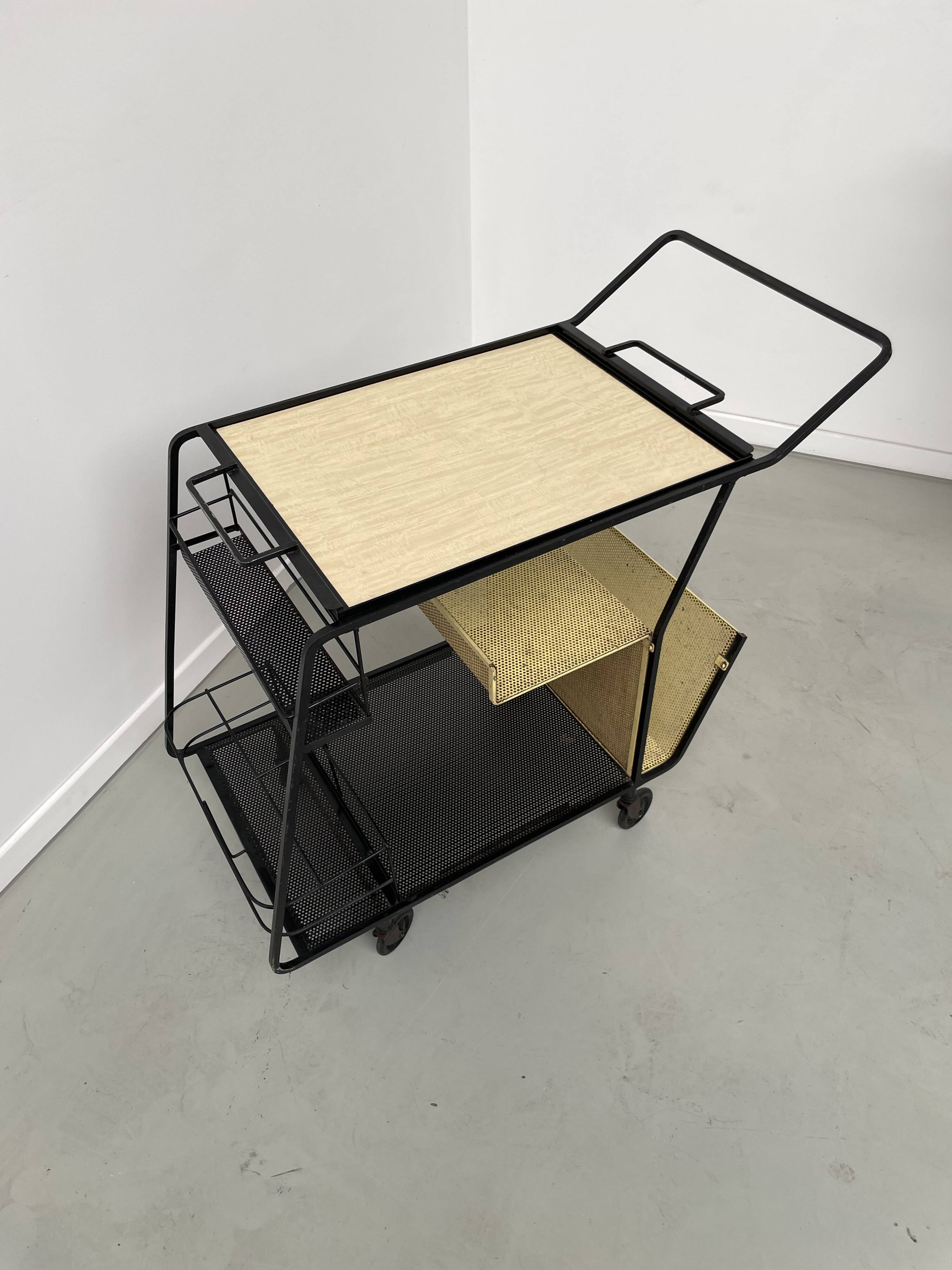 Perforated metal serving trolley in the Mathieu Matégot style