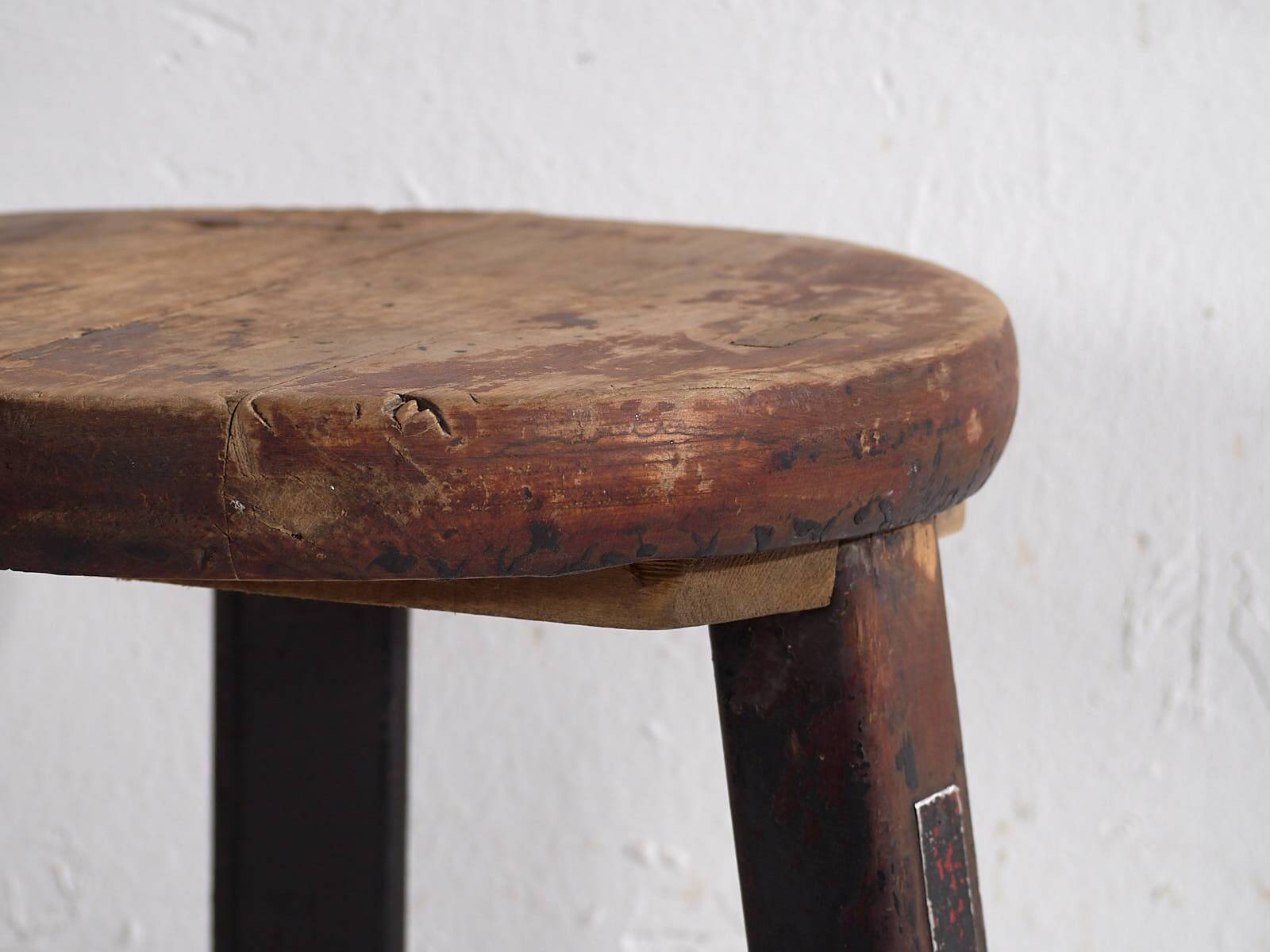 Antique round dark colored stool (c.1900)