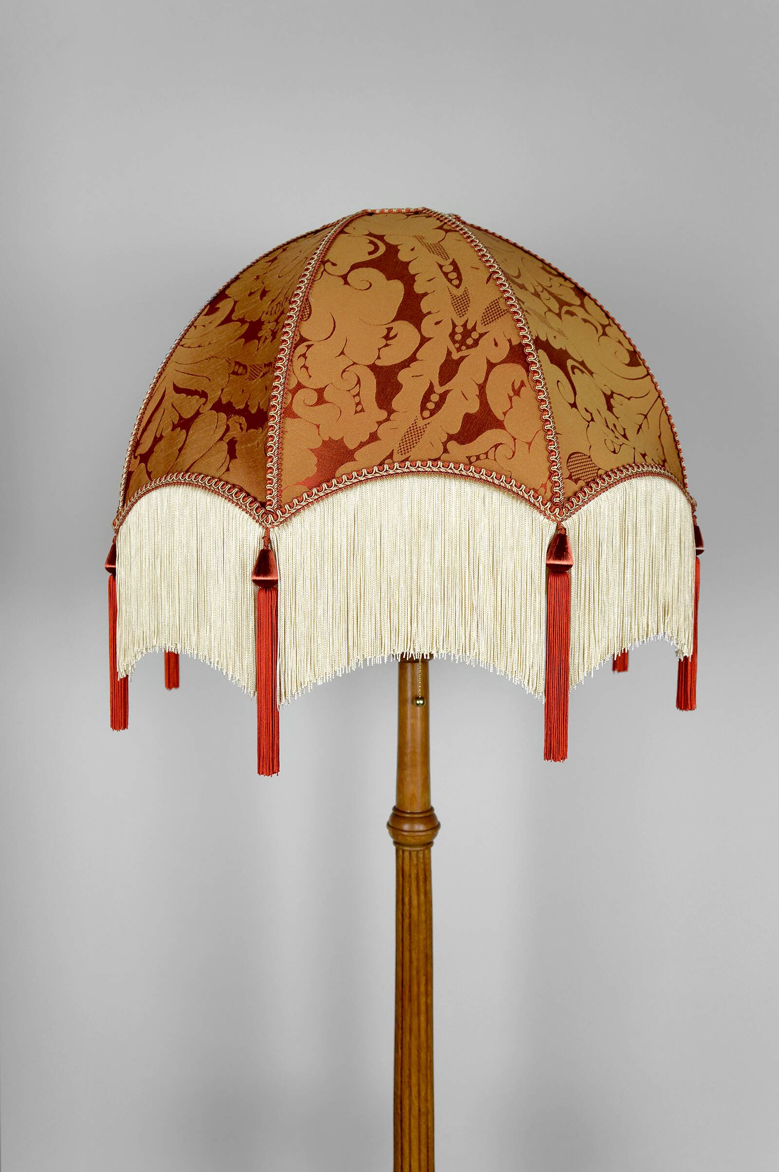 Important Art Deco carved oak floor lamp, France, circa 1920