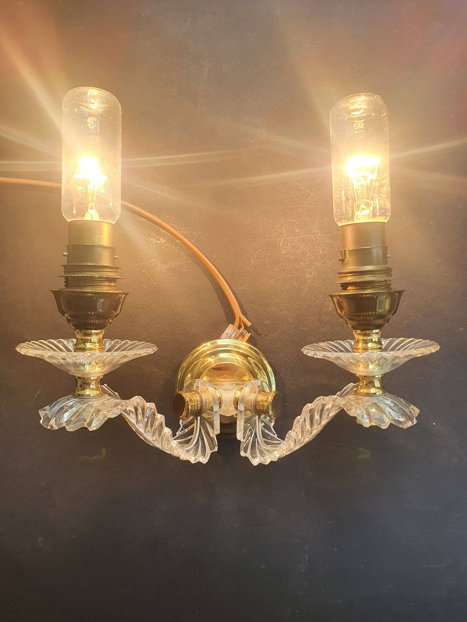 Wall lamp with palm leaf candle holders from the 1950s.