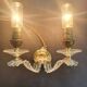 Wall lamp with palm leaf candle holders from the 1950s.