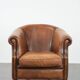 Comfortable club chair made of sheepskin leather