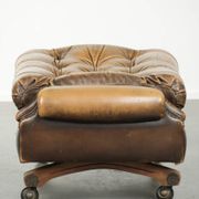 Elegant cowhide English chesterfield ottoman finished with decorative nails