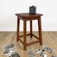 Old solid chocolate wooden stool