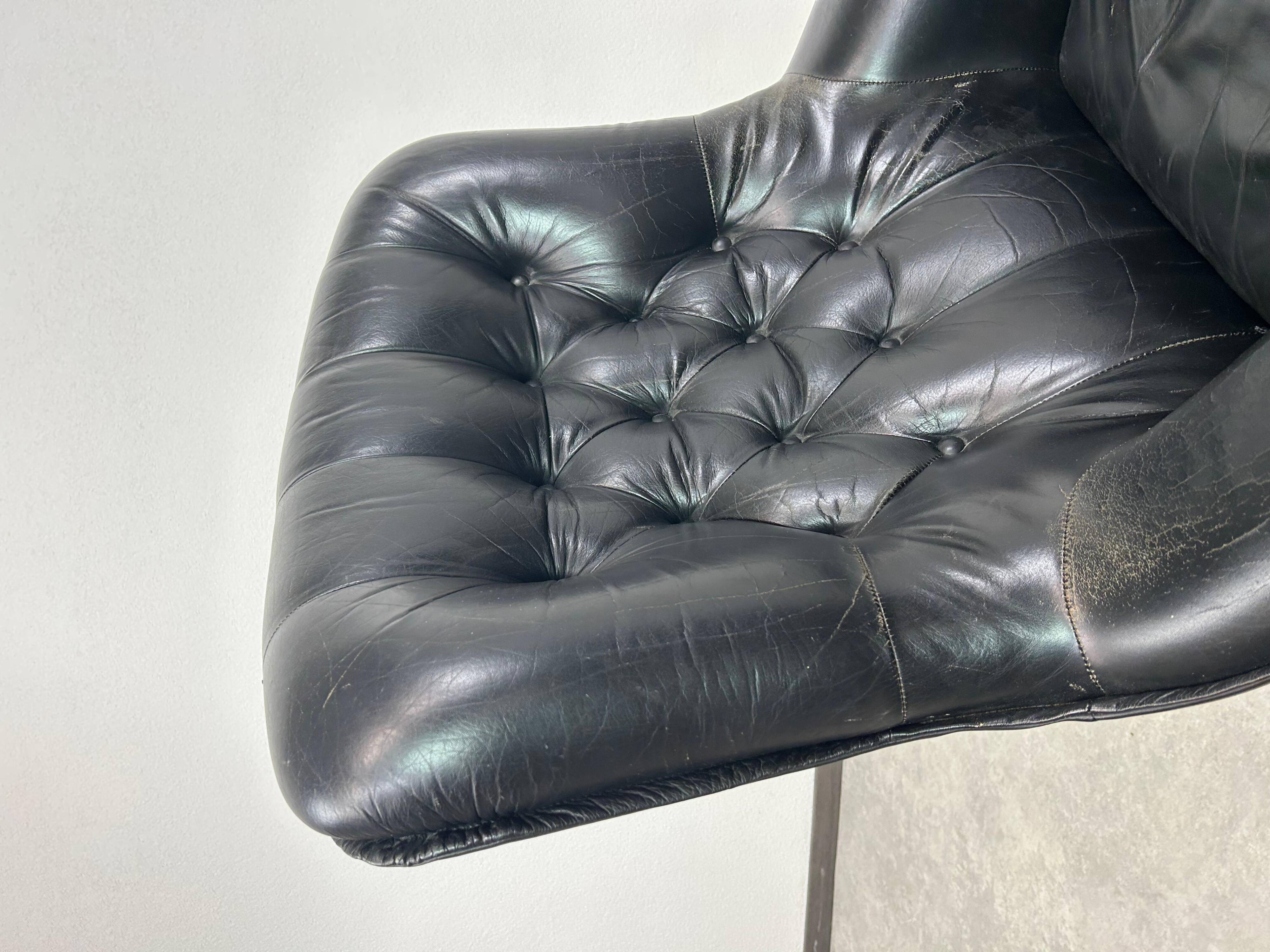 Black leather wingback swivel chair by PeeM
