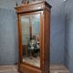 Neo-Gothic mirrored wardrobe in solid walnut – Late 19th century