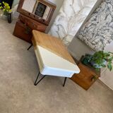 Coffee table with pin legs and gold leaf