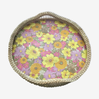 Top of the 60s in rattan braid wood bottom covered with a plastic with pink and yellow flower