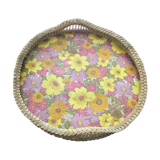 Top of the 60s in rattan braid wood bottom covered with a plastic with pink and yellow flower