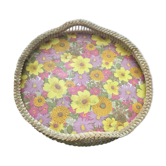 Top of the 60s in rattan braid wood bottom covered with a plastic with pink and yellow flower