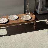 Tray, circular dish or plate made of white striped grey petrified wood.