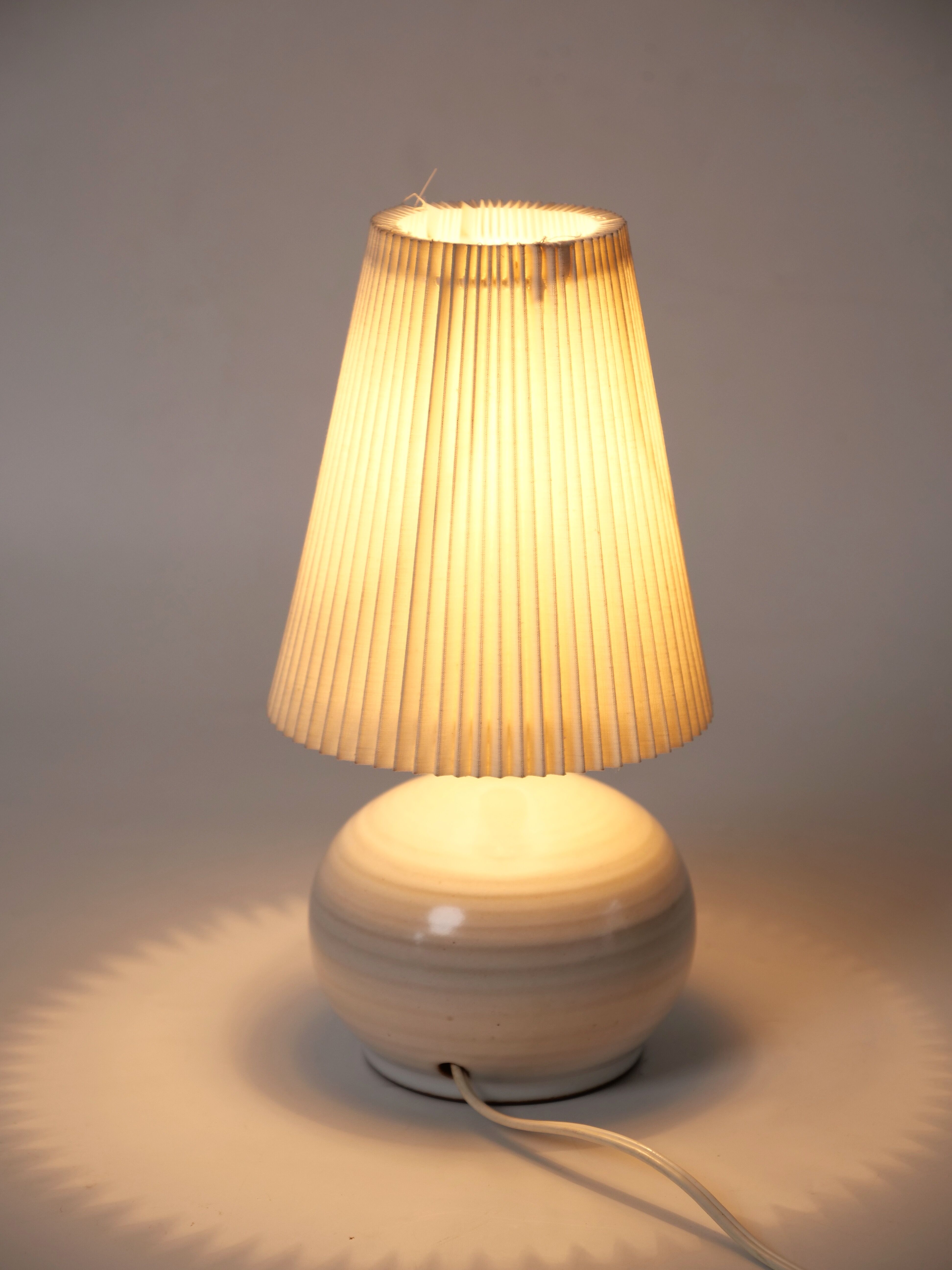 Terracotta lamp signed