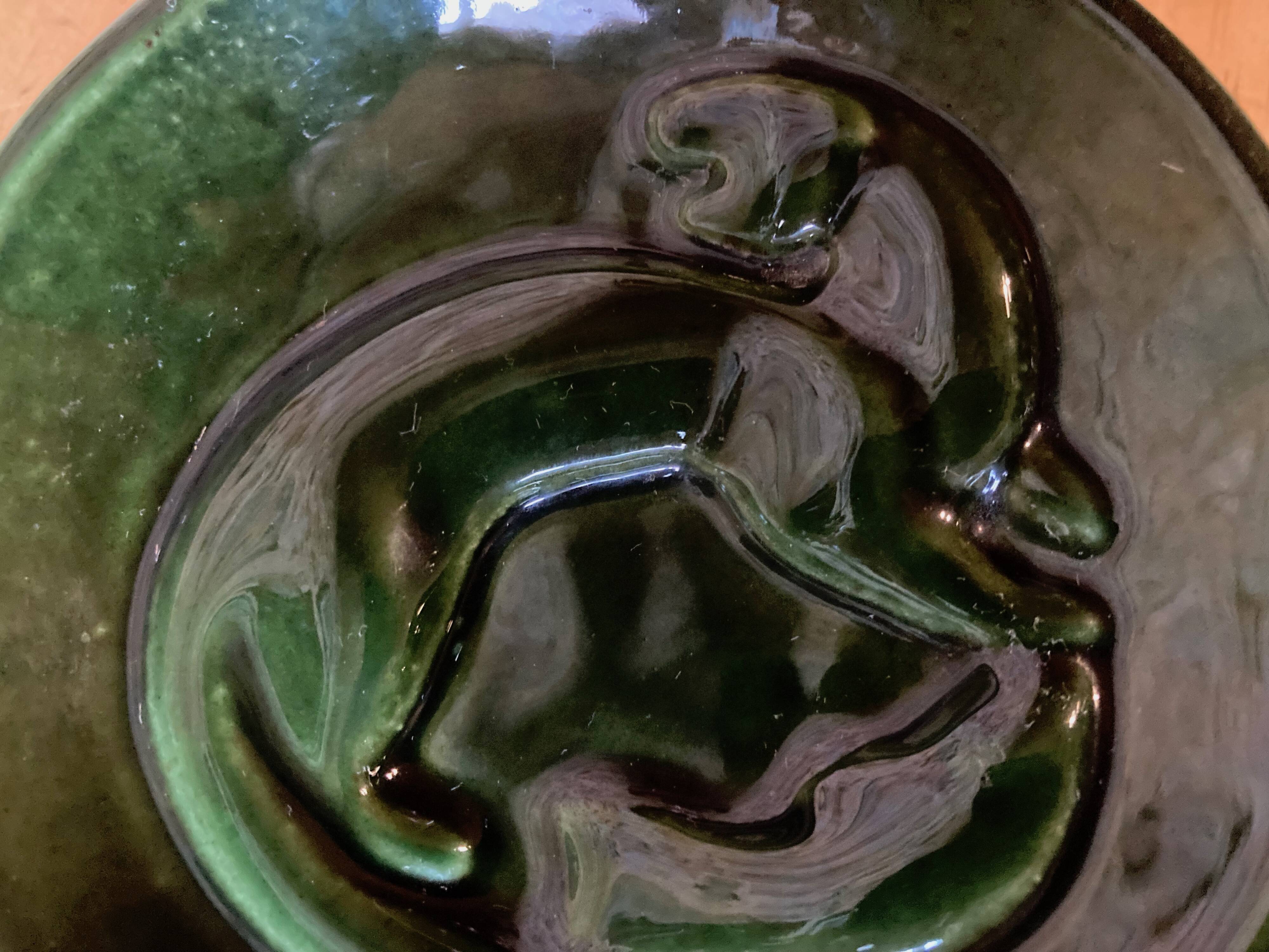 Pocket tray or ashtray with otter and fish in enameled cast iron, Finland, 1960s