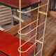 Gold metal wall shelf