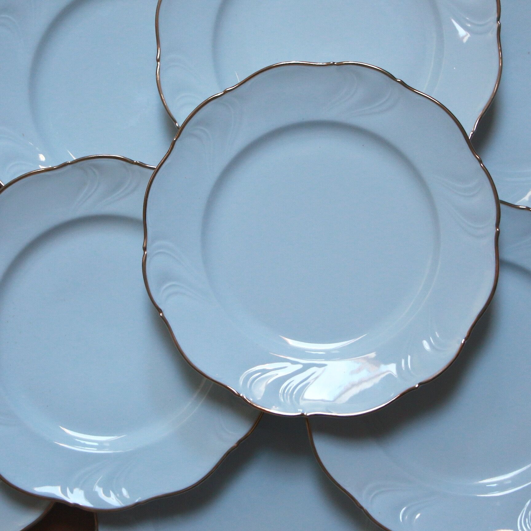White and gold porcelain plates