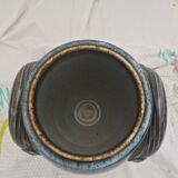 Ceramic vase with sign underneath