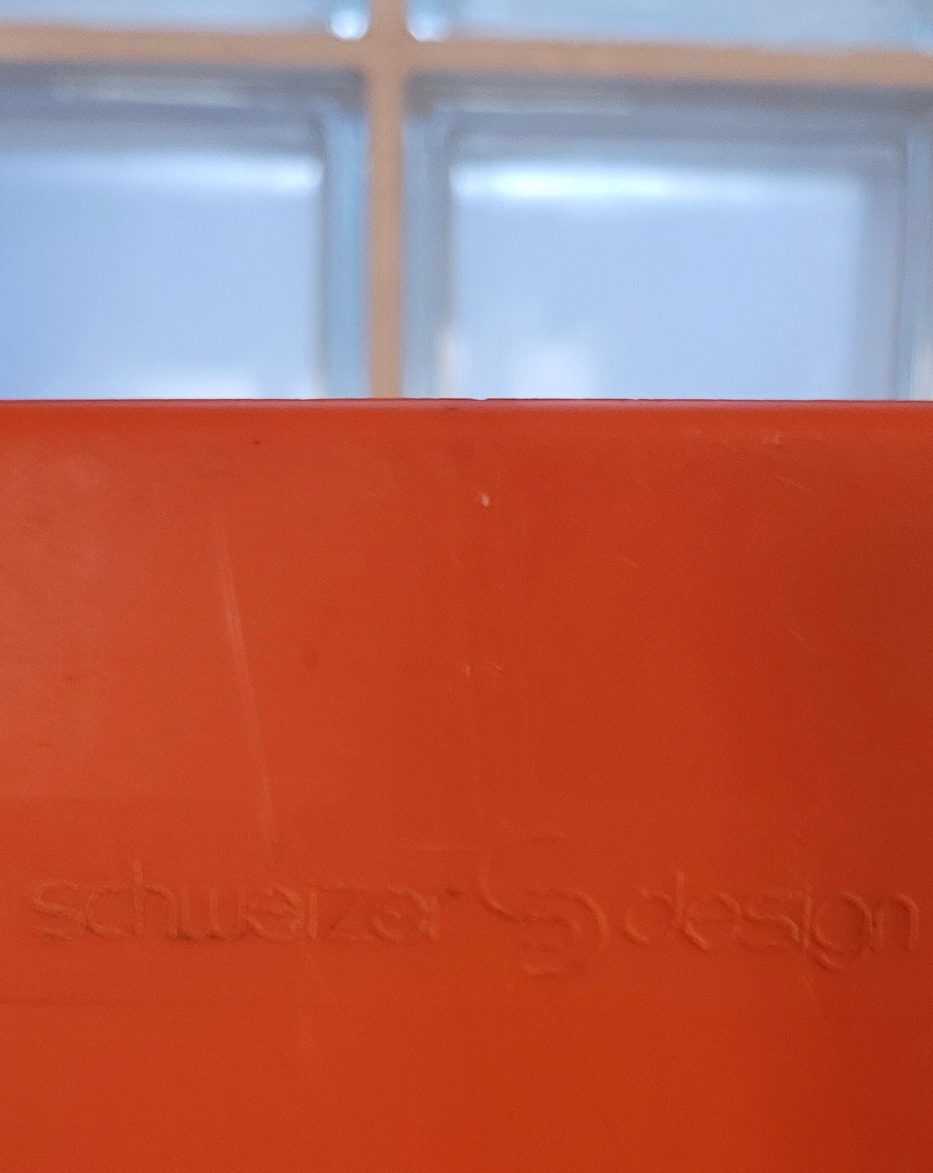 Orange vinyl holder 70s Schweizer-design