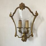 Wall lamp in Louis XV style in brass, shell decoration.