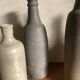 Set de 6 bouteilles de grès et terre cuite 1900-1930