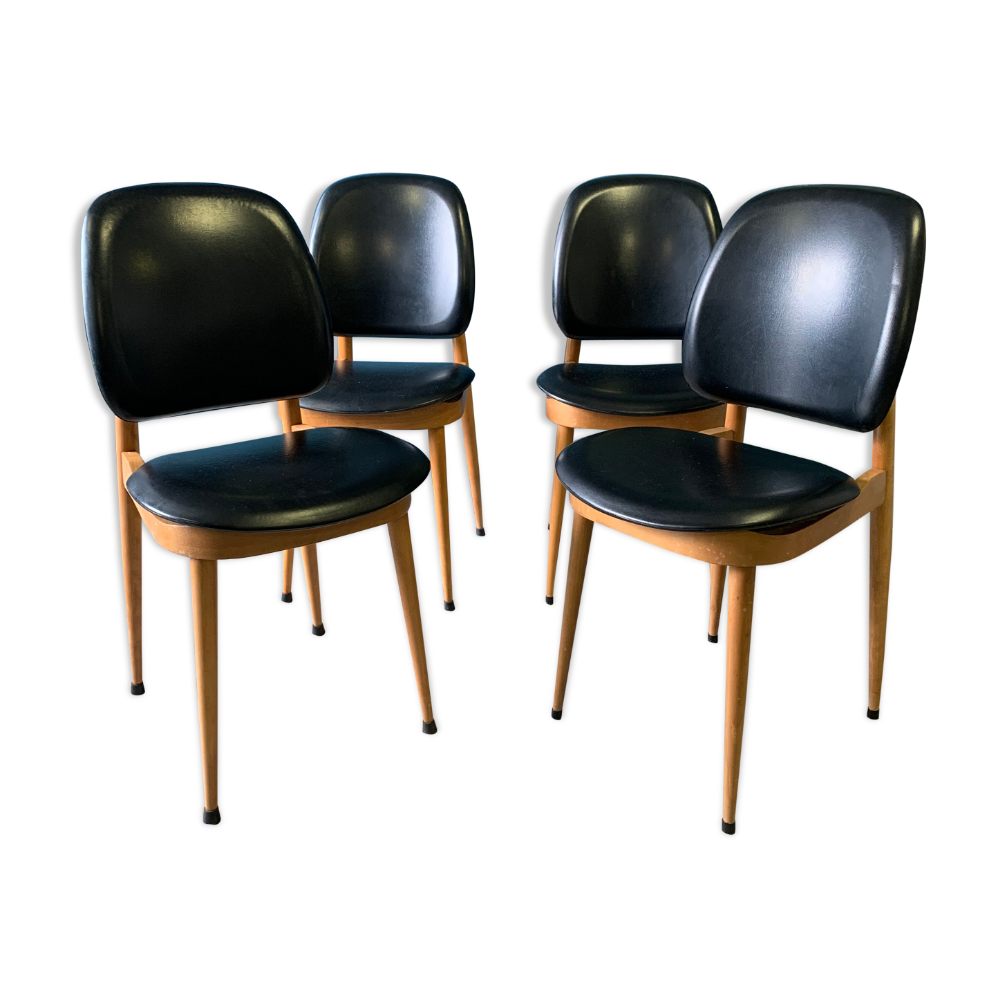 Series of 4 pegasus Baumann chairs
