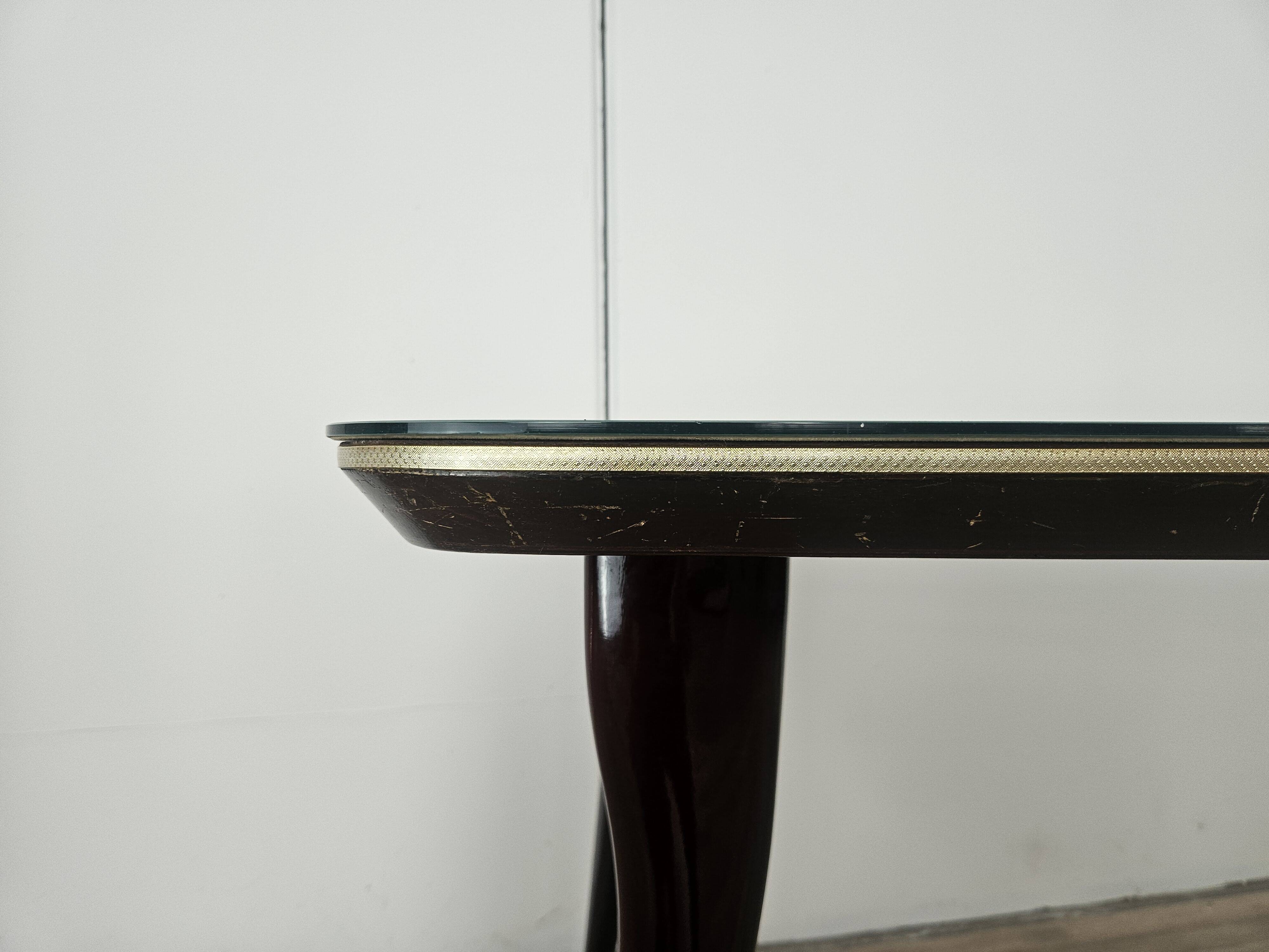 Mid-century mahogany dining table with aquamarine glass top