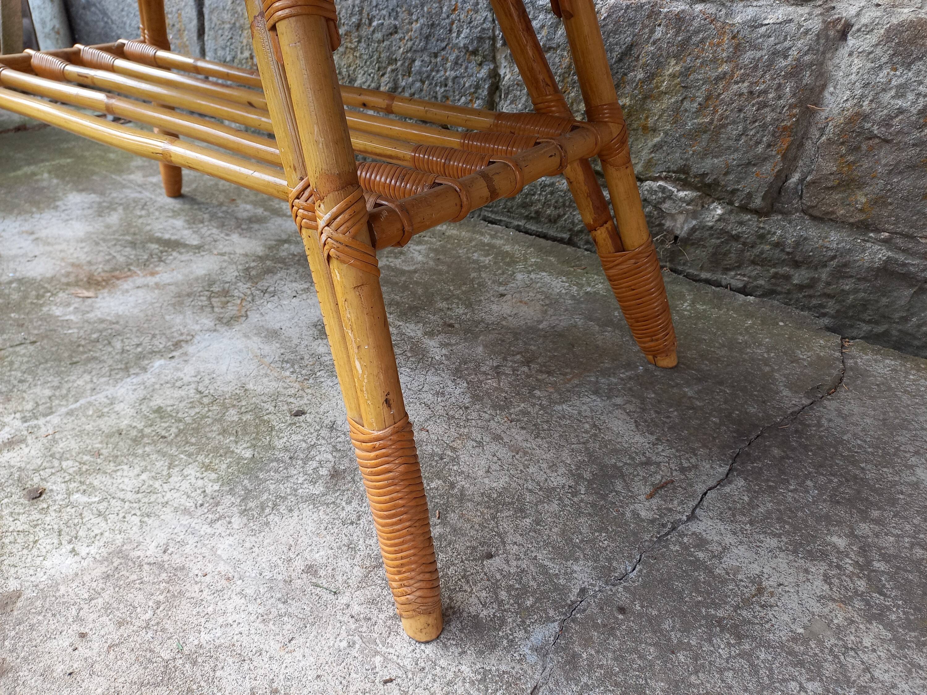 Rattan coffee table with compass legs