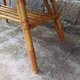 Rattan coffee table with compass legs