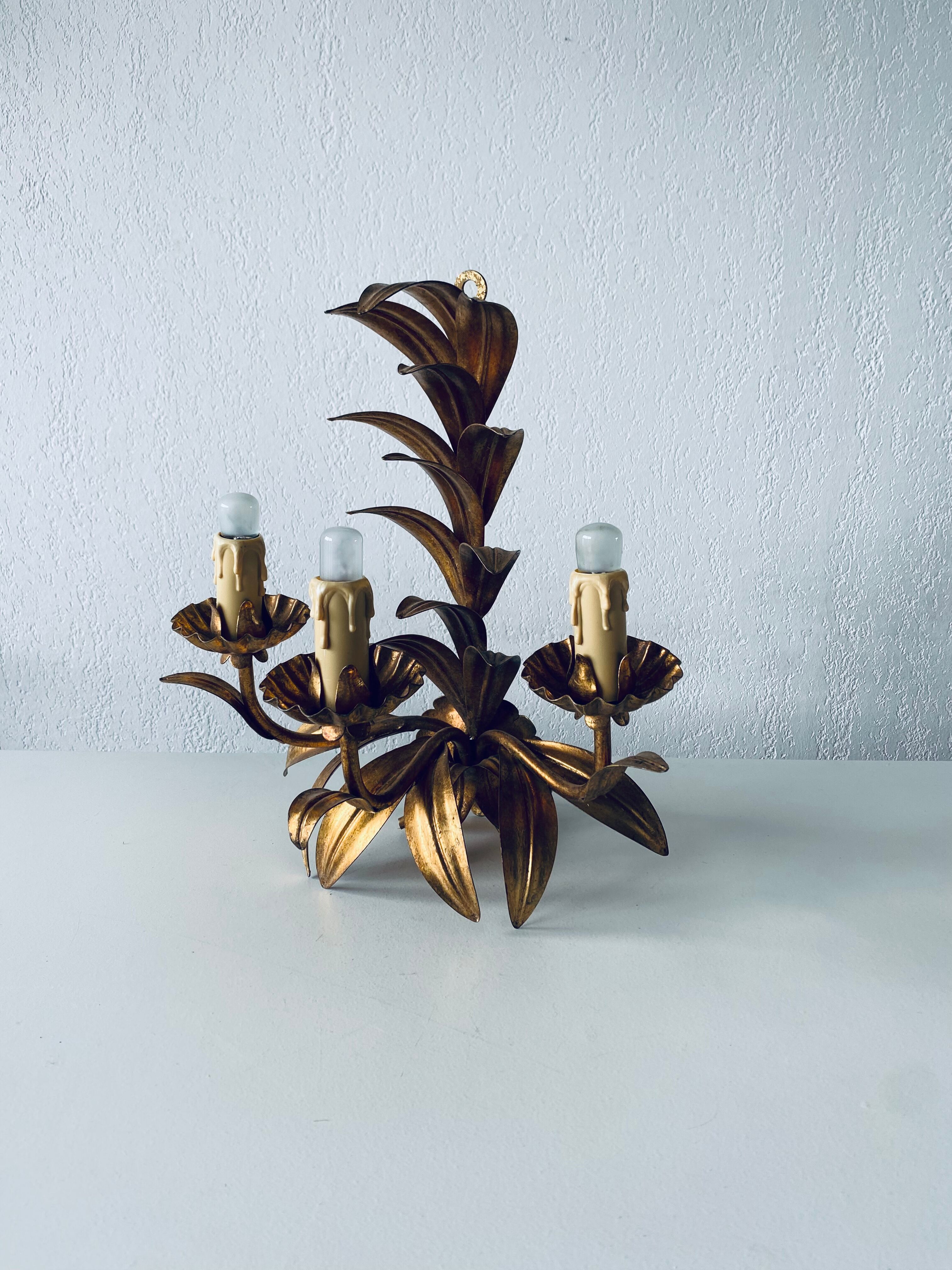 Golden leaf wall light