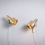 Pair of adjustable wall lamps designed by Per Sundstedt for Kosta Lampan