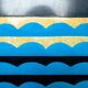Room divider in art deco style with birds, geometric patterns, red, yellow, blue