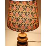 Turned wooden base lamp with printed lampshade