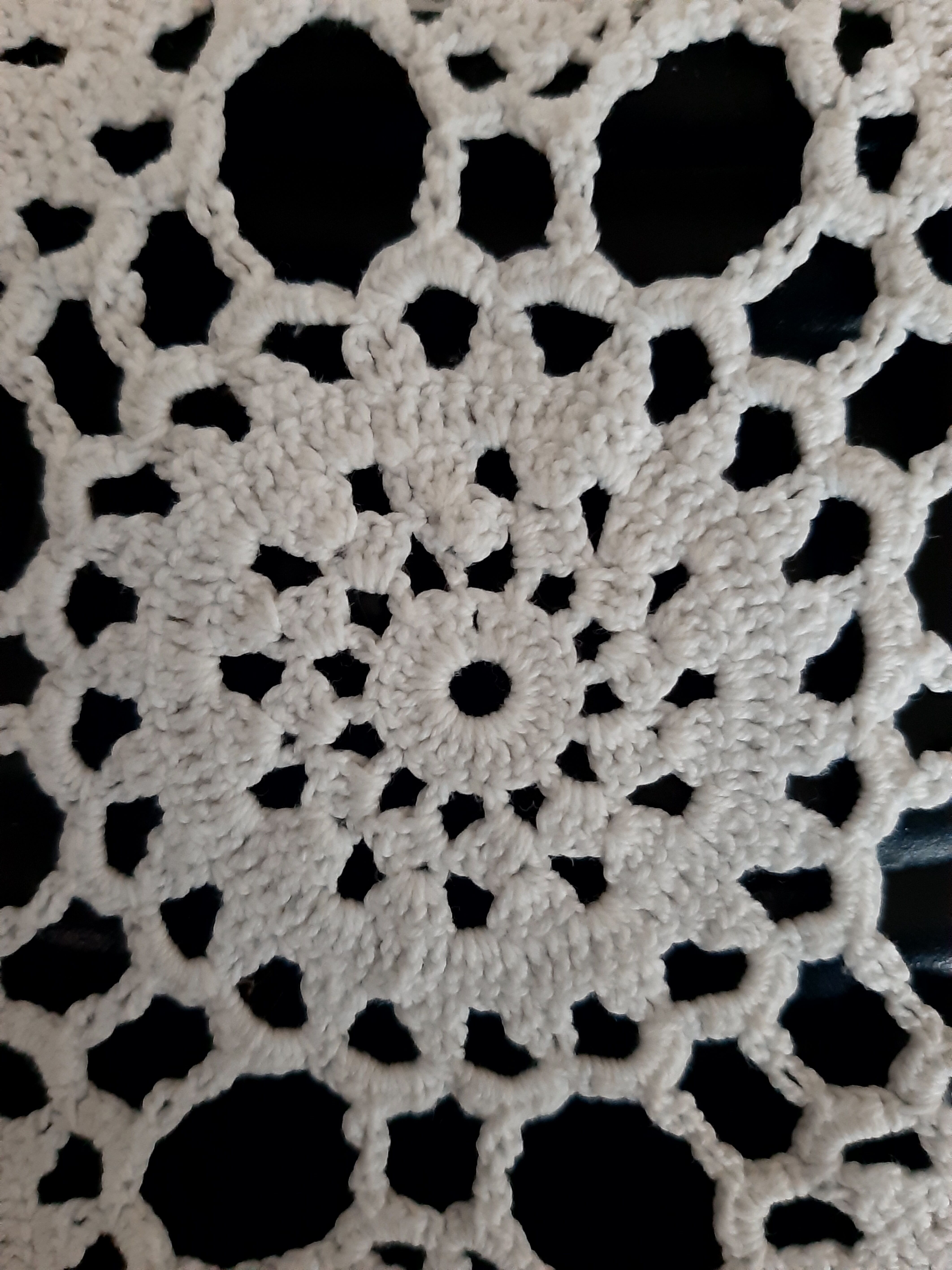 Old crocheted round tablecloth
