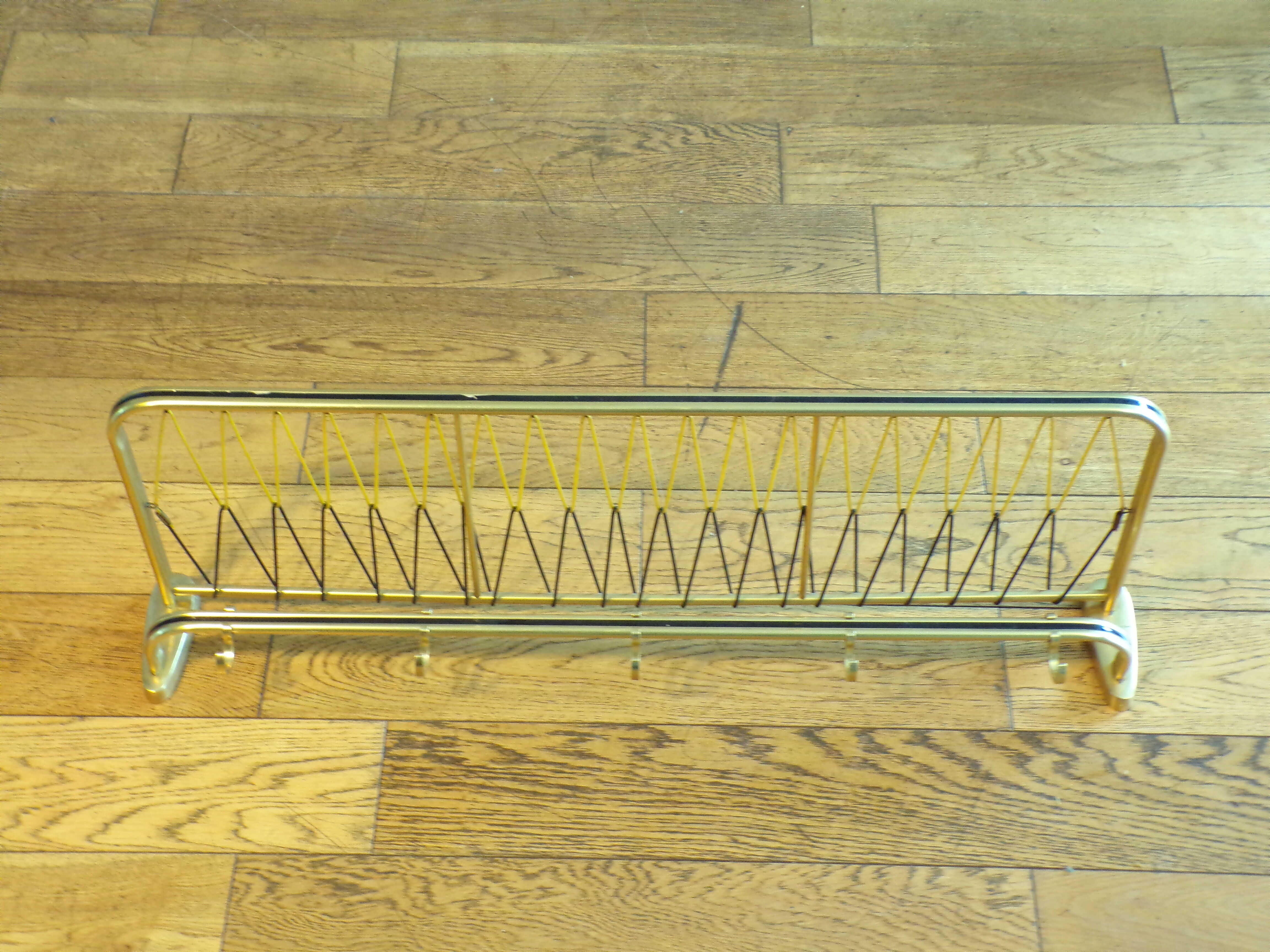 Vintage coat racks like train luggage racks