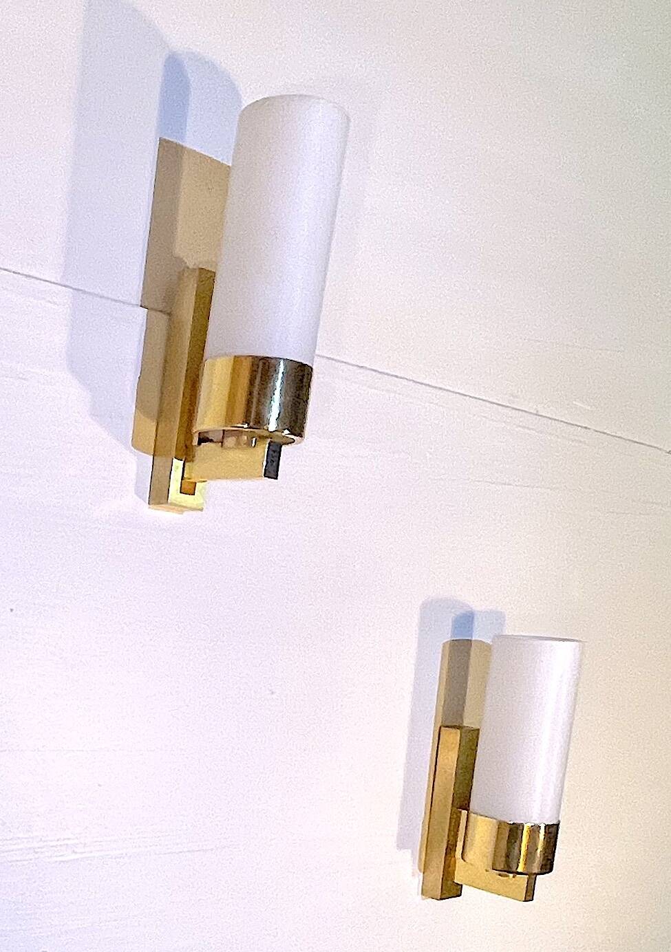 Set of three brass and opaline sconces, mid-century France