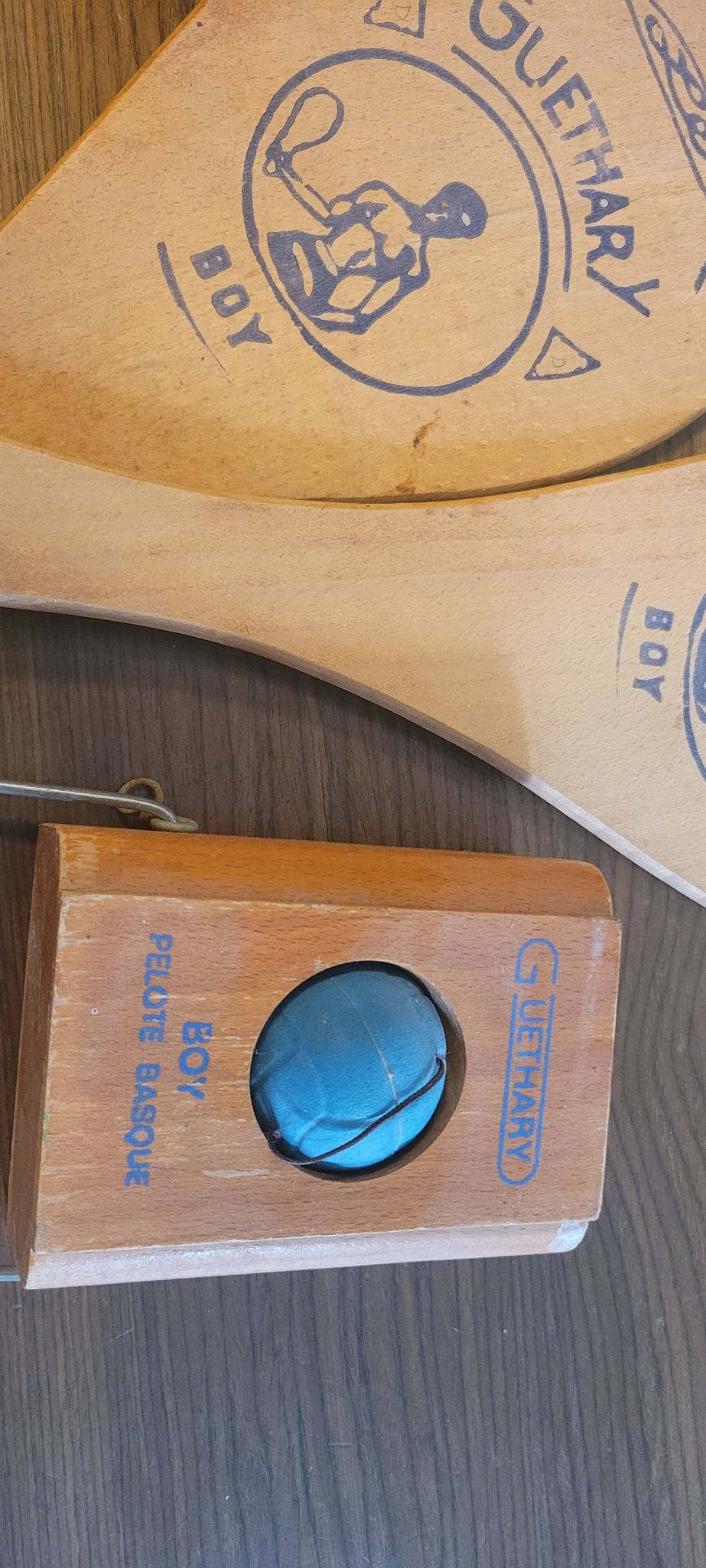 Basque pelota game with 2 rackets and 1 ball from the 50s and 60s, Guéthary boy in wood.