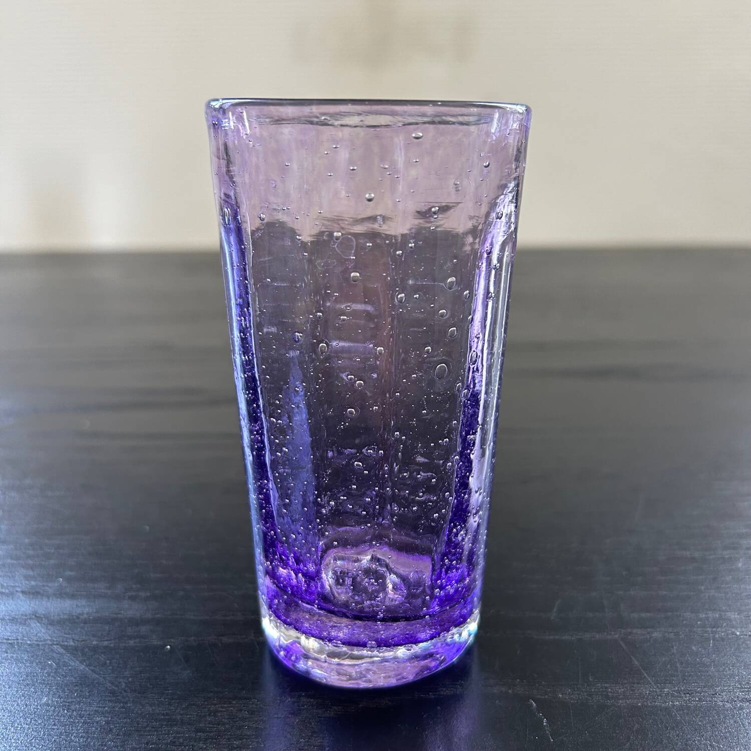 Biot glass in purple glass
