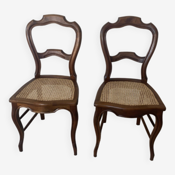Solid walnut chairs with cane seats