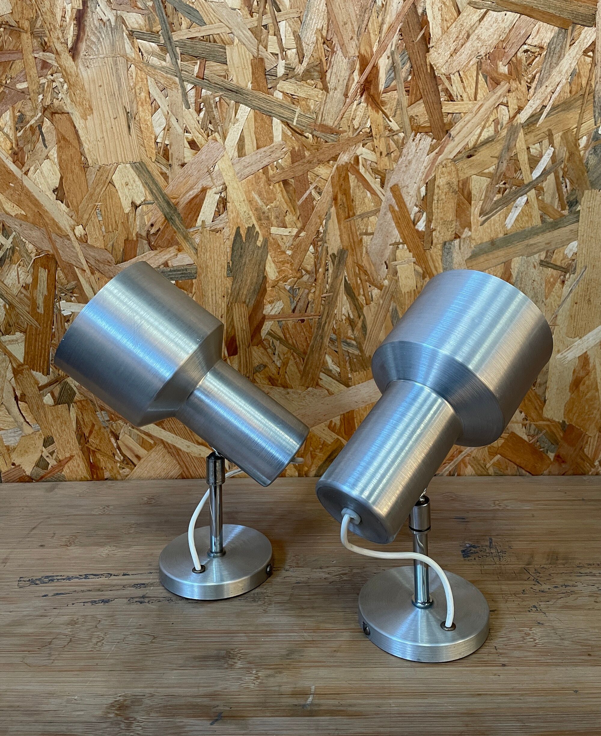 Pair of swivel brushed metal sconces