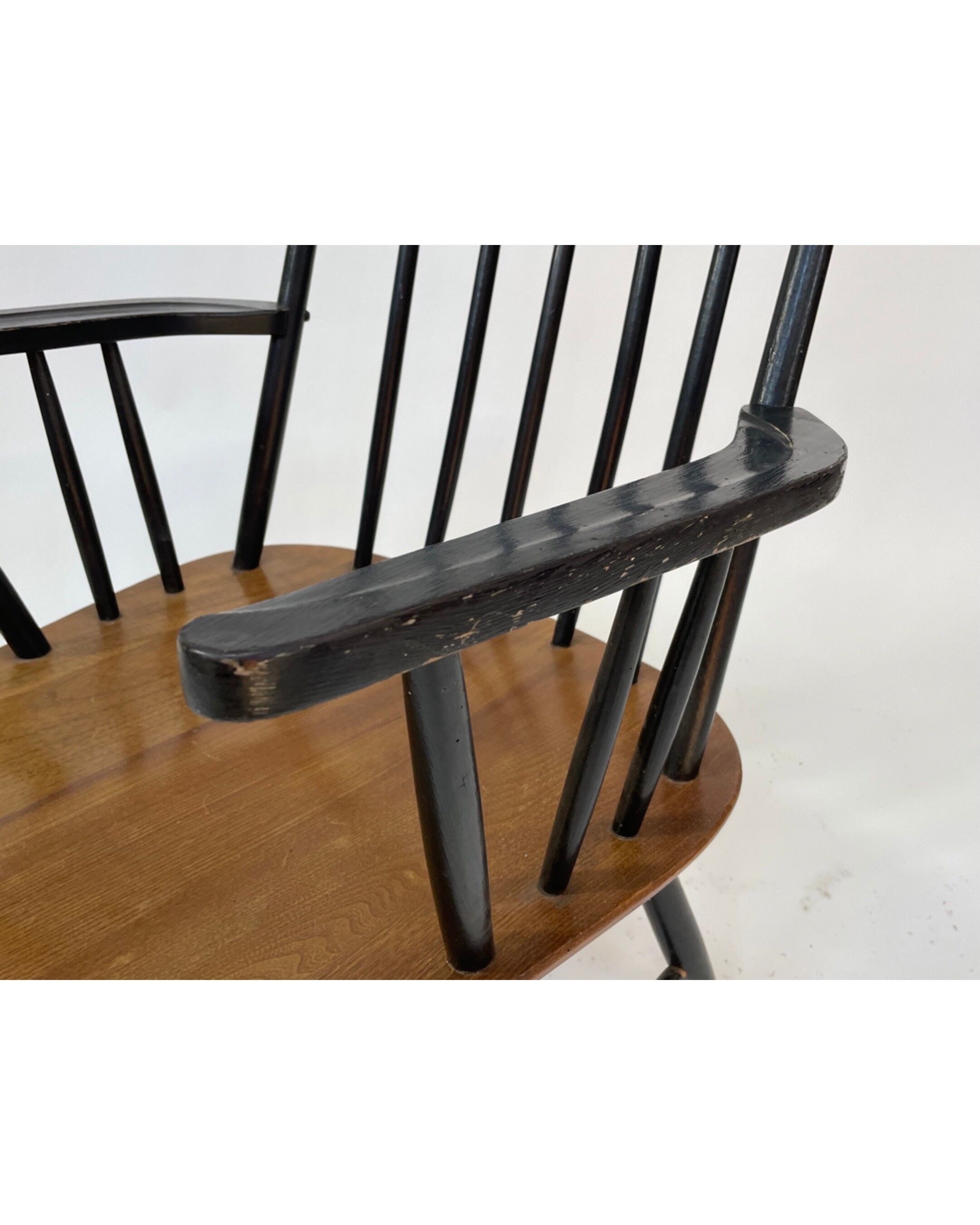 Vintage easy chair with high back and armrest from the 60s