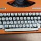 Olympia traveler de luxe orange typewriter serviced and new ribbon