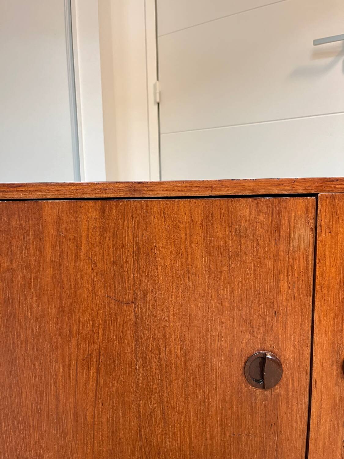 Vintage 70's sideboard with cat eyes handles