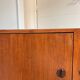 Vintage 70's sideboard with cat eyes handles