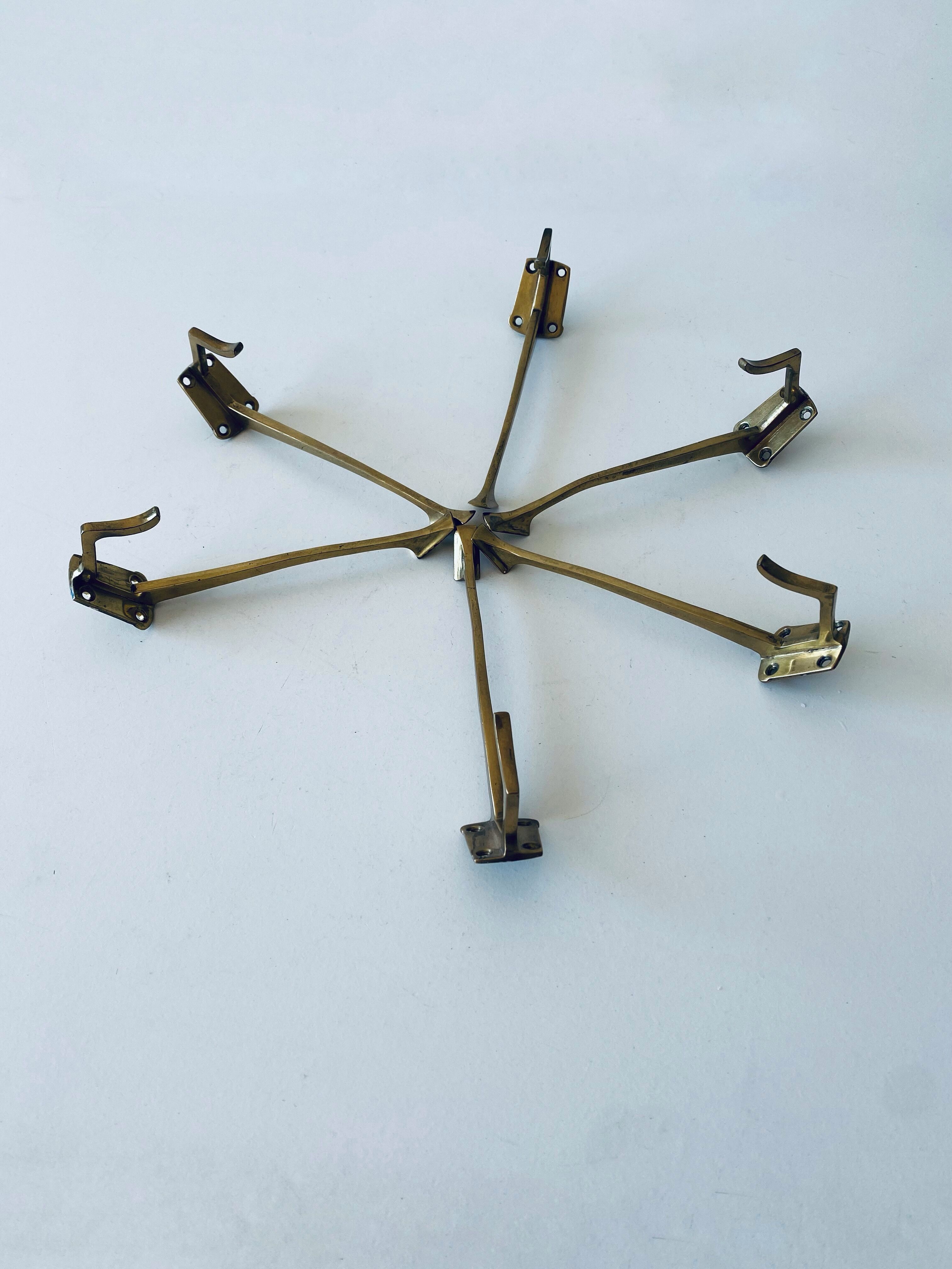 Pair of vintage brass hooks