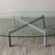 Design coffee table in beveled glass and steel foot