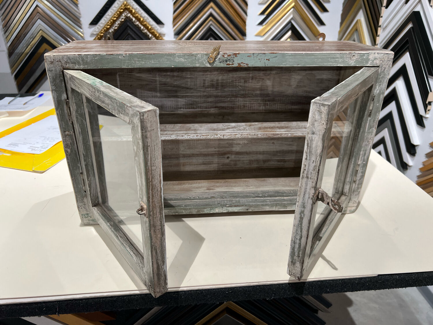 Small teak wall shelf