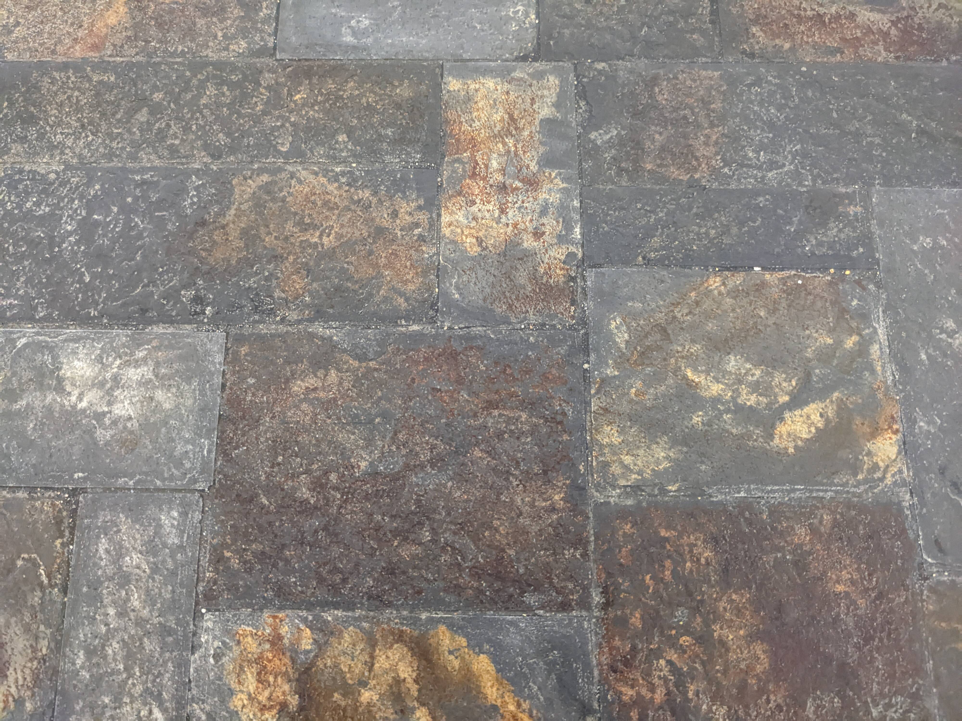 Brutalist coffee table in natural stone and wrought iron, France circa 1960.