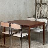 Extendable teak and teak veneer dining table